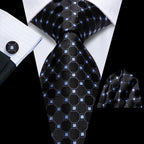 Men's black tie silk with blue geometric pattern for formal occasions