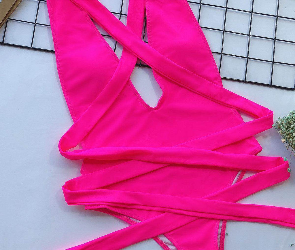 Trendsi tied one-piece swimwear in vibrant pink with stylish strap design for chic beach days