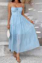 Light blue tiered cami vacation dress with a flowy silhouette, perfect for summer outings