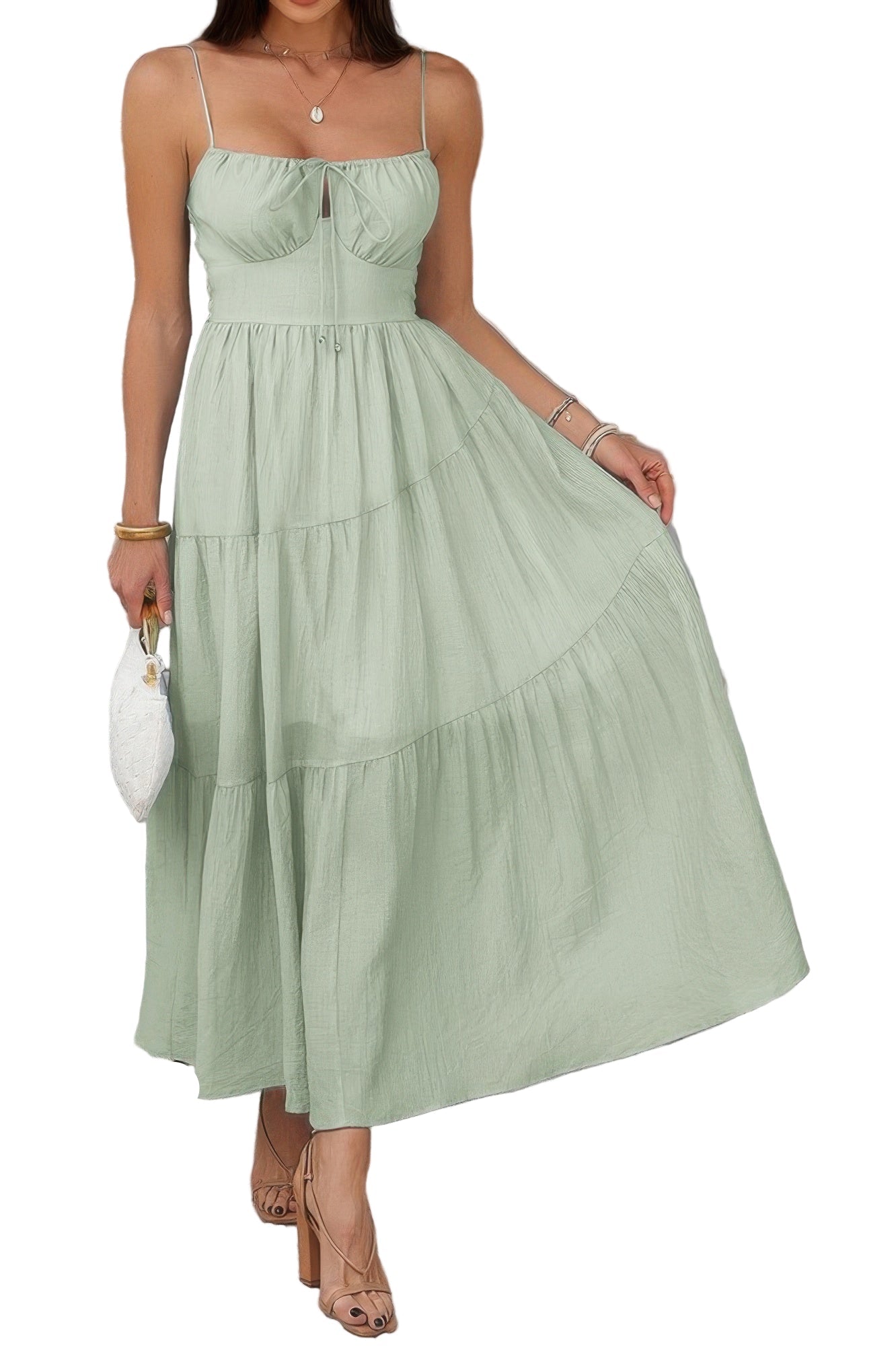 Women's tiered cami vacation dress in light green, featuring a flowy design and adjustable straps