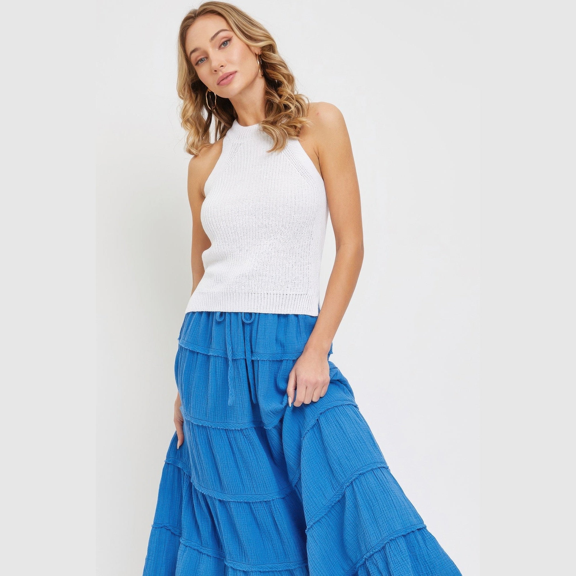 VacationGrabs tiered maxi skirt for women in blue worn with white sleeveless top