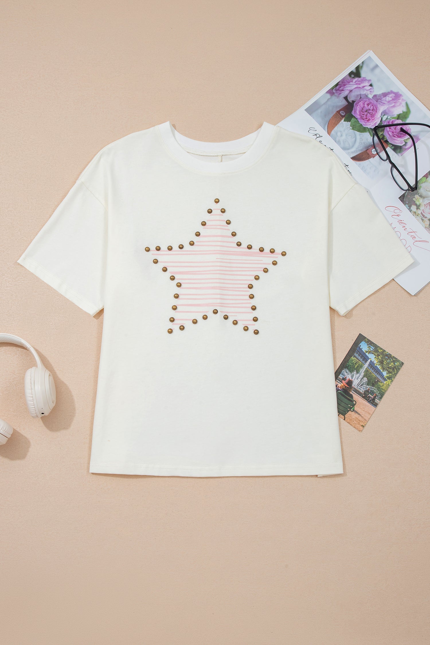 Cream women's top with star design, perfect for fans of top country and western artists