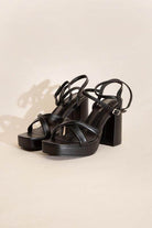 Top Guy Footwear cross ankle strap heels in black with chunky block heels for stylish comfort