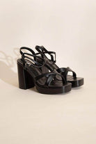 Top Guy Footwear women's cross ankle strap heels in black with chunky platform for stylish comfort