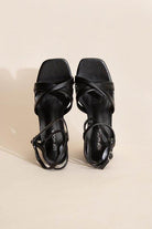 Top Guy Footwear cross ankle strap heels in black with stylish square toe design