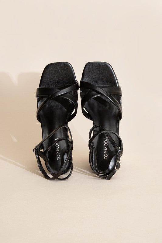 Top Guy Footwear cross ankle strap heels in black with stylish square toe design