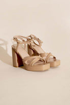 Beige Top Guy Footwear cross ankle strap heels with a chunky block heel for stylish comfort