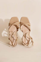 Top Guy Footwear cross ankle strap heels in nude color with stylish design for elegant occasions