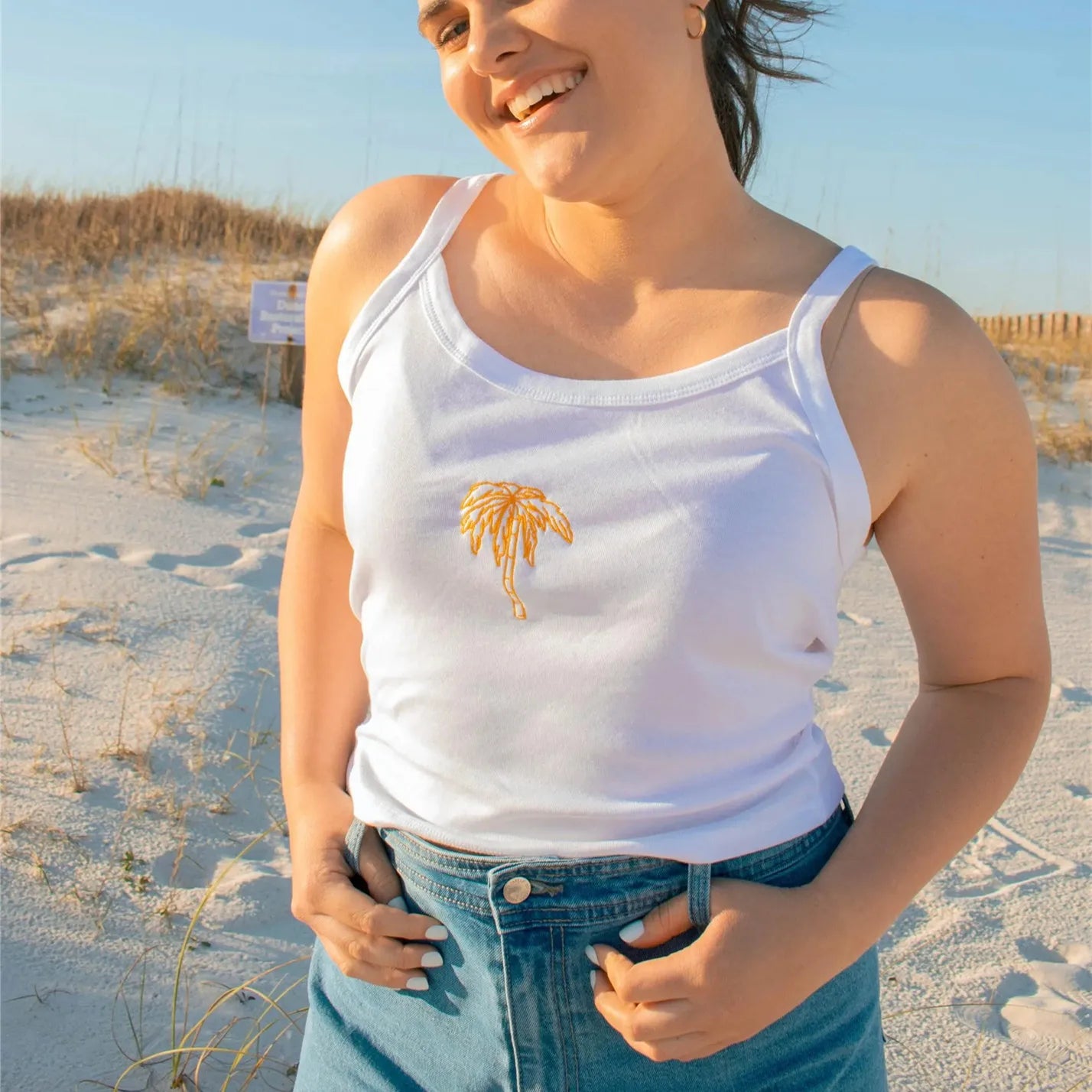 Women's white tank top with gold palm tree design for summer wear