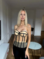 Women's nude top with corset design, perfect for stylish occasions