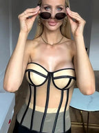 Women's beige top with corset details for stylish occasions