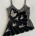 Women's black top with mesh and rhinestone butterfly design for casual wear