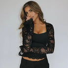 Women's black top with mesh, stylish long sleeves for casual wear
