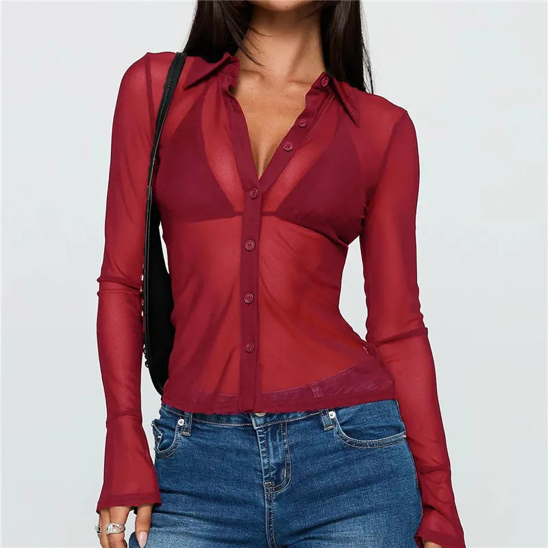 Women's burgundy top with mesh, ideal for stylish layering