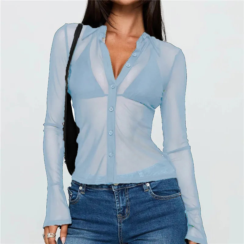 Women's light blue top with mesh, perfect for casual outings