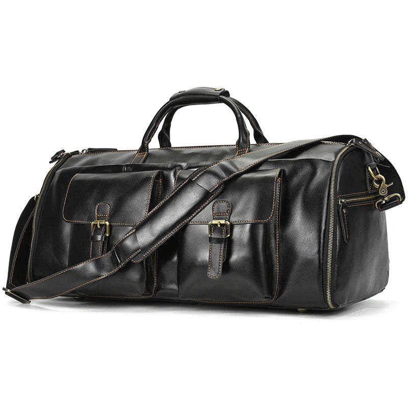 Black leather travel bag with multiple pockets and adjustable strap