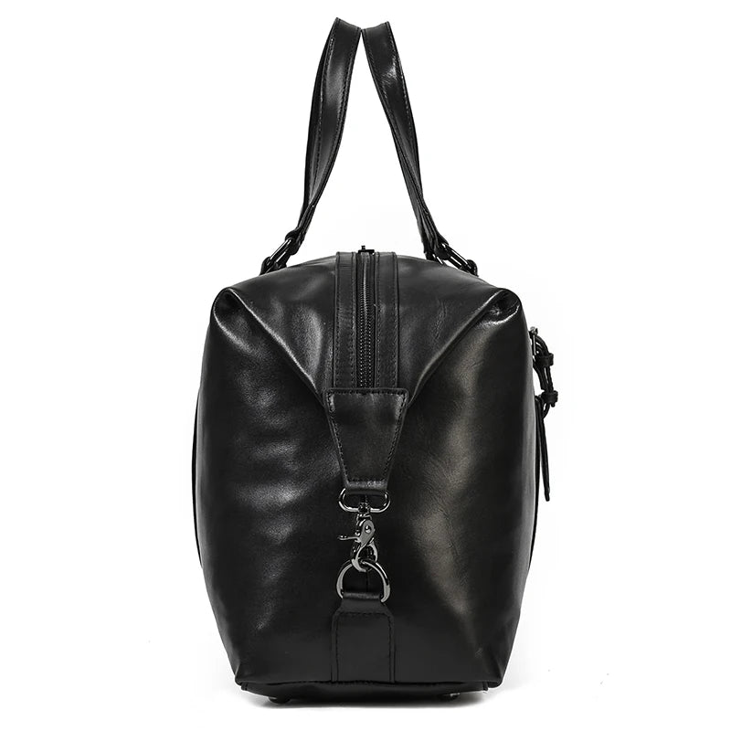 Black leather travel bag with double handles for stylish trips