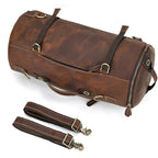 Brown leather travel bag with sturdy straps for weekend getaways