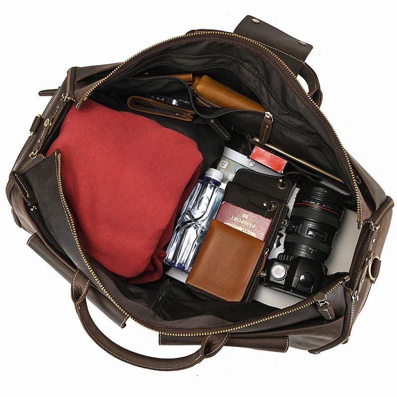 Brown leather travel bag with ample space for clothing and gear