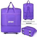 Purple travel bag with wheels, ideal for sports and outdoor activities
