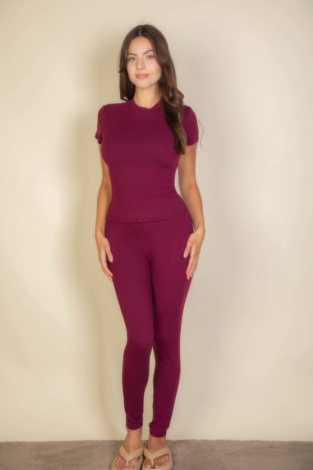 Burgundy women's T-shirt and legging set, perfect travel clothing essentials for women