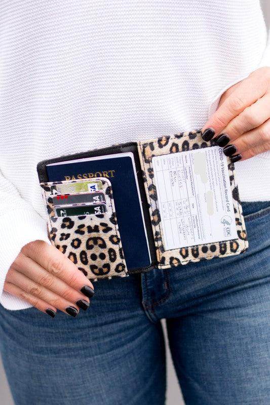 Leopard print travel credit card holder featuring slots for cards and passport for stylish organization