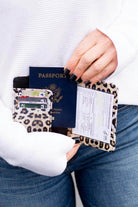 Aili's Corner leopard print travel credit card holder with passport and cards for stylish travel organization