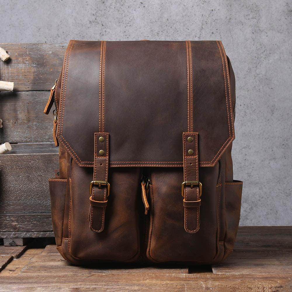 Stylish travel leather backpack with dual front pockets for versatile travel needs