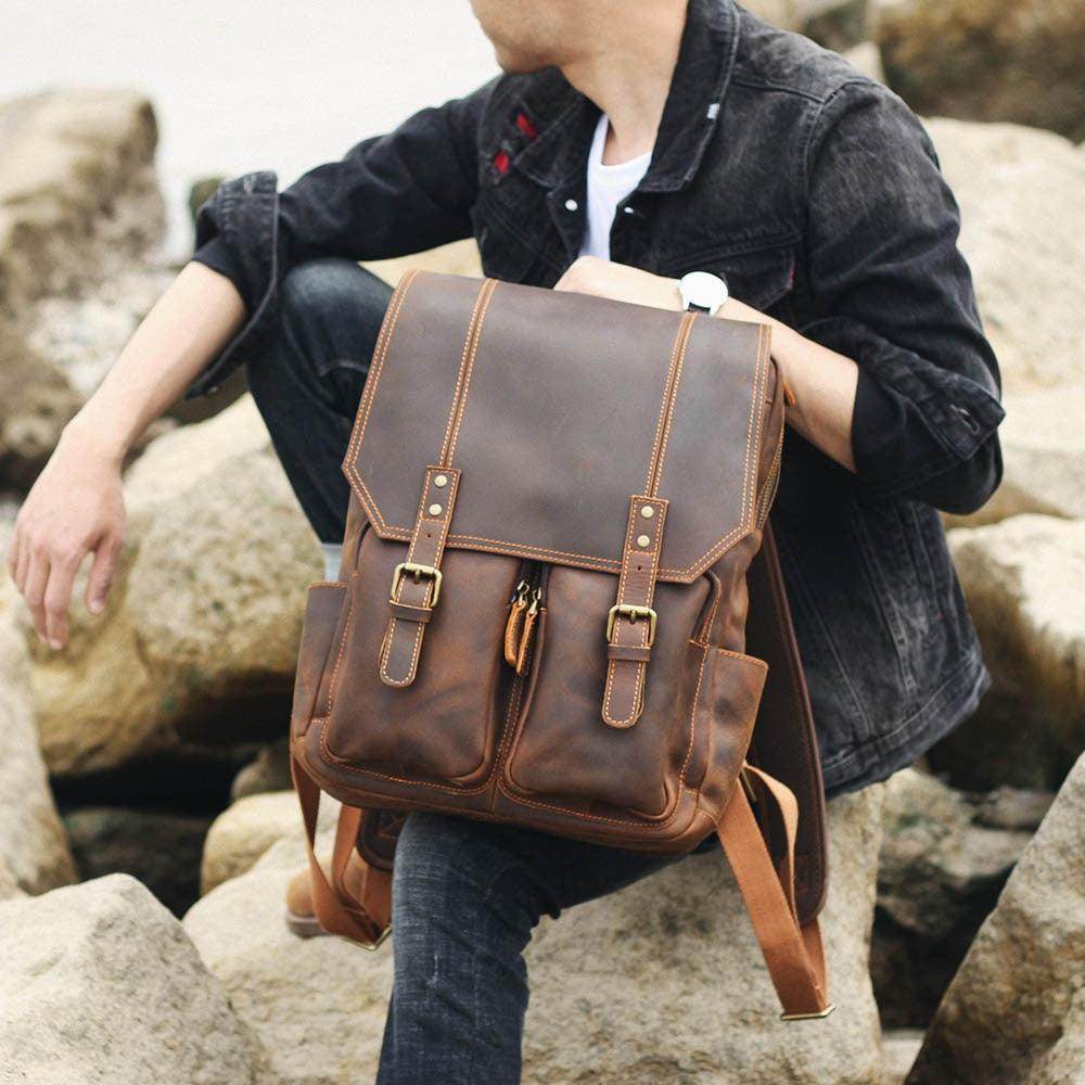 Stylish travel leather backpack by VacationGrabs with dual front pockets and adjustable straps
