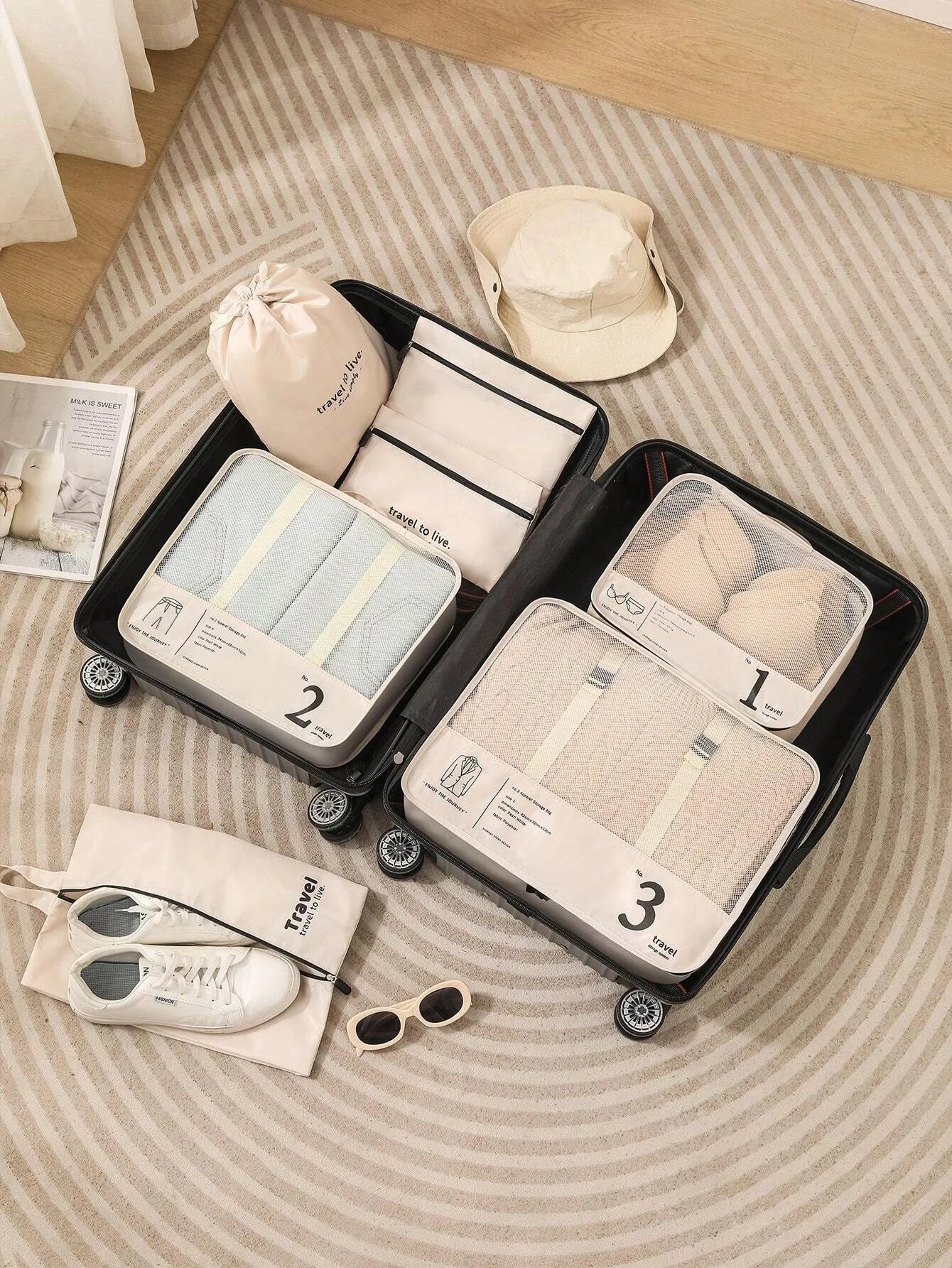 Travel luggage organizer set in beige and gray for efficient packing
