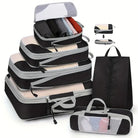 Black travel packing cubes set for organized luggage during trips