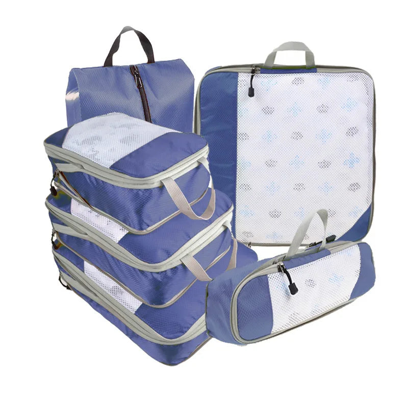Blue travel packing cubes set for organized suitcase storage