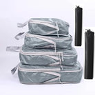Gray travel packing cubes set for organized luggage transport
