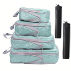Travel packing cubes set in teal with zippers for organized packing