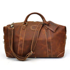 Stylish brown leather travel shoulder bag with detachable strap and sturdy handles for easy carrying
