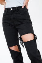 Trendy black ripped jeans by Insane Gene featuring stylish distressed details and a high-waisted fit