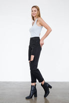 Trendy black ripped jeans by Insane Gene with a slim fit and stylish distressed details