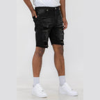 Men's ripped black denim shorts by WEIV, styled with a trendy camo shirt and shorts
