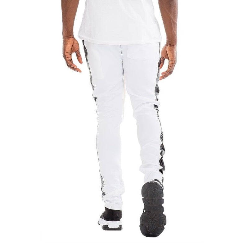Back view of trendy leather stripe joggers in white with black leather stripes on sides