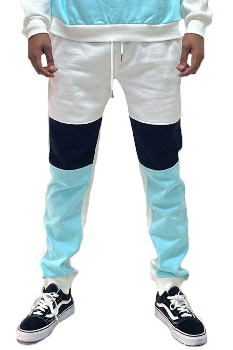 Trendy sweatpants for travel in light blue and white with a modern color-block design