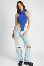 Emory Park trendy turtle neck sweater in blue paired with ripped jeans for a chic casual look
