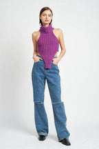 Emory Park trendy turtle neck sweater in purple, styled with wide leg jeans for a chic look