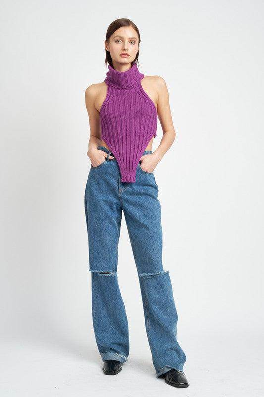 Emory Park trendy turtle neck sweater in purple, styled with wide leg jeans for a chic look