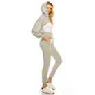 Andante USA trendy two-piece outfit featuring a hoodie and jogger pants in a soft gray color