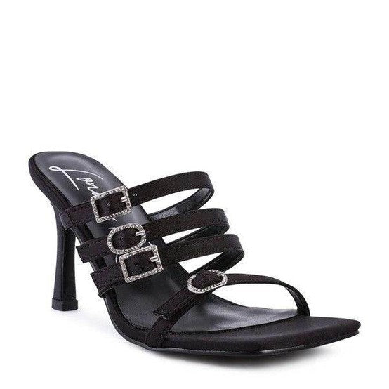 Elegant black heeled sandals with multiple straps and buckle details, perfect trendy vacation footwear