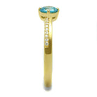 Elegant gold 925 sterling silver ring featuring a blue gemstone and shimmering accents