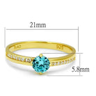 Gold 925 sterling silver ring featuring a blue gemstone and sparkling accents for elegant style