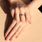 Elegant gold 925 sterling silver ring featuring a stunning turquoise gemstone on a hand