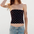 Women's black tube top with blue polka dots, perfect for summer outings