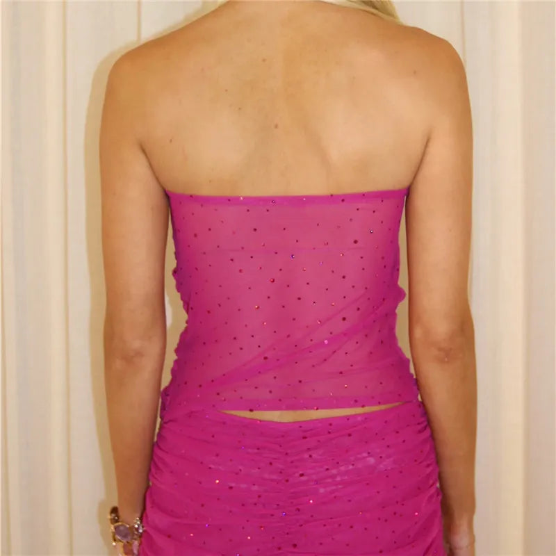 Pink tube top with shimmering details, perfect for summer outings